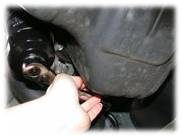 Remove the filter, using a filter socket or filter wrench if necessary.